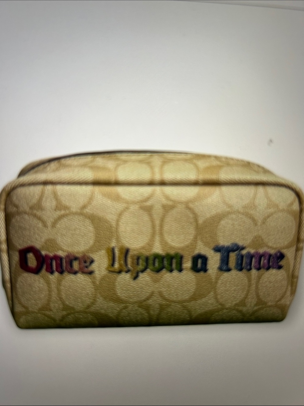 Coach Beige Canvas Pouch with Multicolor 'Once Upon a Time' collectible piece